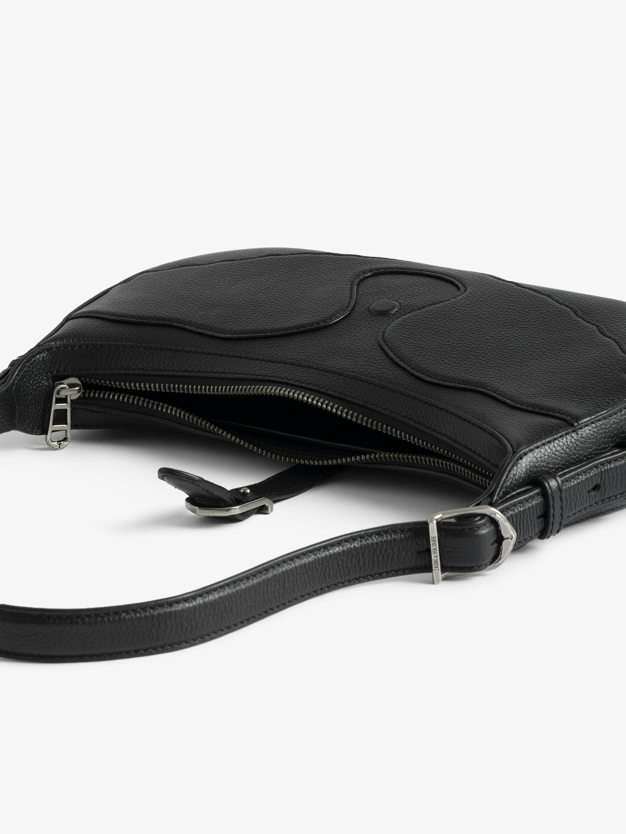 Moonrise Bag - Baguette bag in grained leather with signature wings.